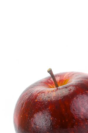 A red apple isolated against a white backgroundの写真素材