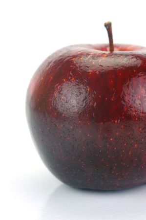 A red apple isolated against a white backgroundの写真素材