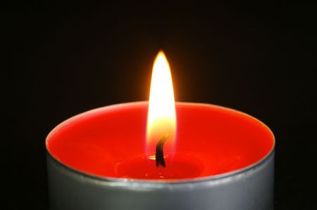 Scented candals isolated against a black backgroundの写真素材