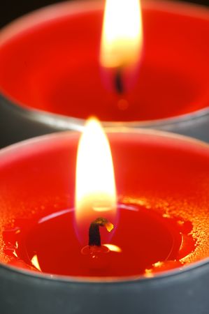 Scented candals isolated against a black backgroundの写真素材