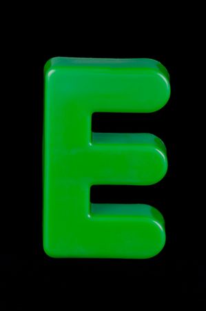 Letters of the alphabet isolated against a black backgroundの写真素材