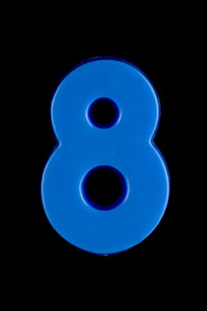 Numbers isolated against a black backgroundの写真素材