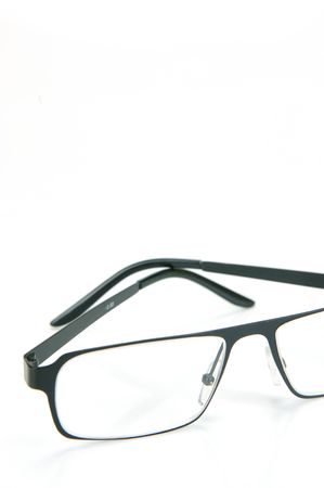 A pair of reading glasses isolated against a white backgroundの写真素材