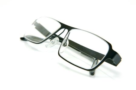 A pair of reading glasses isolated against a white backgroundの写真素材