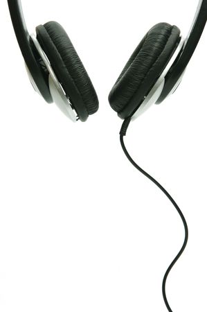 A pair of headphones isolated against a white backgroundの写真素材