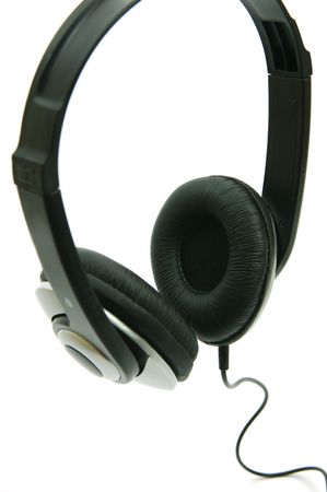 A pair of headphones isolated against a white backgroundの写真素材