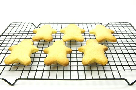 Cookies on a cooling rack isolated against a white backgroundの写真素材