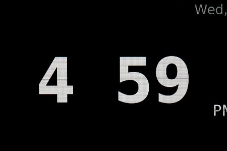 A close up macro shot of a digital clockの写真素材
