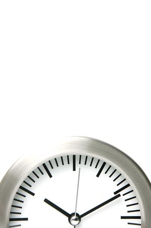 An analogue clock set against a white backgroundの写真素材