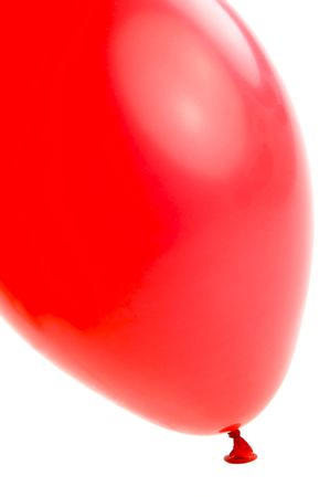 A red balloon isolated against a white backgroundの写真素材