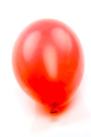 A red balloon isolated against a white backgroundの写真素材