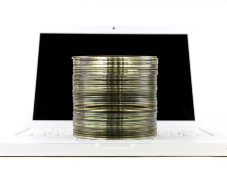 A stock of compact discs isolated against a white backgroundの写真素材