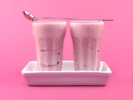 Mixed Berry Smoothie isolated against a pink backgroundの写真素材