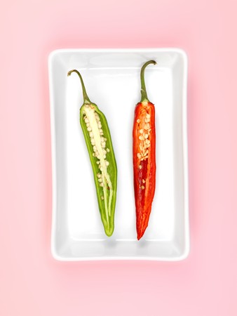 Chilli Peppers isolated on a pink backgroundの写真素材