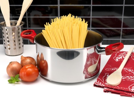 Pasta in a cooking pot ready for cookingの写真素材