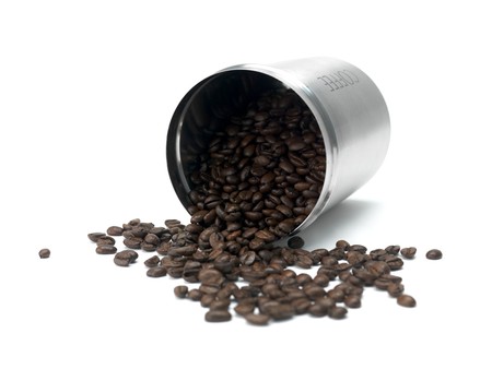 Coffee beans in a canister isolated against a white backgroundの写真素材