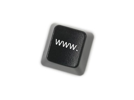 A keyboard key isolated against a white backgroundの写真素材