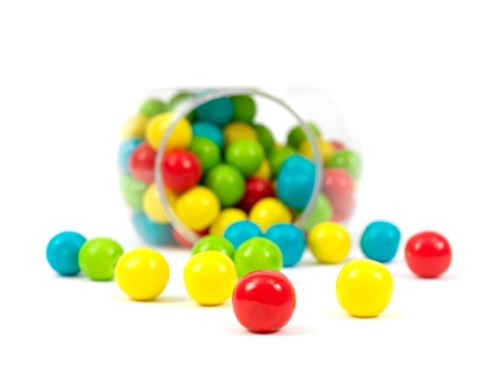 Gumballs in a jar isolated against a white backgroundの写真素材
