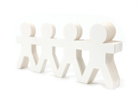 Cutout figures of people isolated against a white backgroundの写真素材