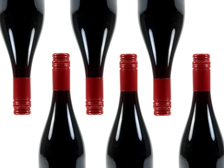 Redn wine bottles isolated against a white backgroundの写真素材