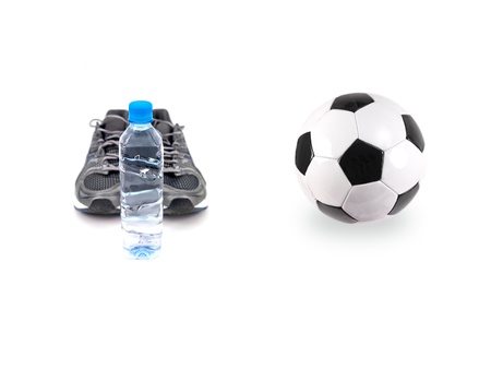 A soccer ball and training gear  isolated against a white backgroundの写真素材