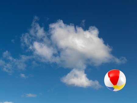 A beach ball in the skyの写真素材
