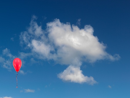 A morning shot of a cloudy blue sky and a balloonの写真素材