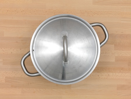 Pots and pans on a wooden kitchen benchの写真素材