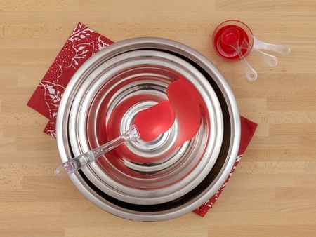 Mixing Bowls on a wooden kitchen benchの写真素材