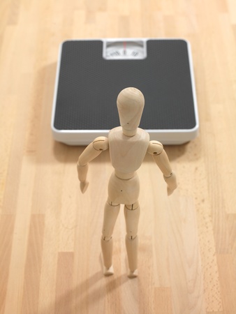 Bathroom scales isolated against a white backgroundの写真素材