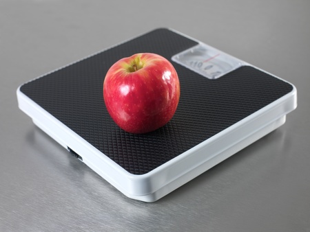 Bathroom scales isolated against a metallic backgroundの写真素材