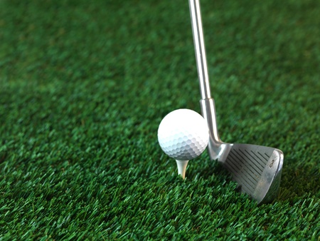 Golfing equipment on artficial grass outdoorsの写真素材