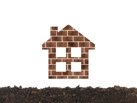 A conceptual cutout house of red bricksの写真素材