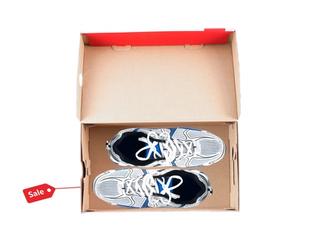 Sports runners situated in a shoe boxの写真素材