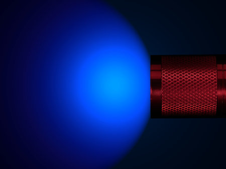 A flash light isolated against a black backgroundの写真素材