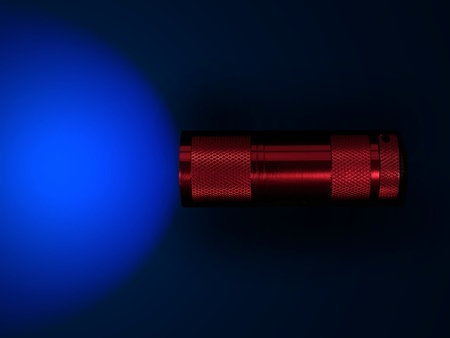 A flash light isolated against a black backgroundの写真素材
