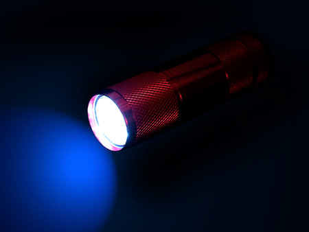 A flash light isolated against a black background