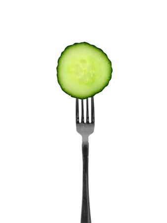 CSlices of cucumber isolated against a white backgroundの写真素材