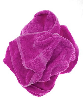 Colored towels isolated against a white backgroundの写真素材