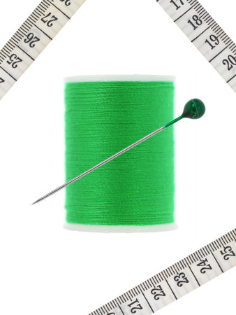 Sewing equipment isolated against a white background