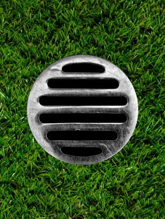 A drain hole isolate on a white backgroundの写真素材