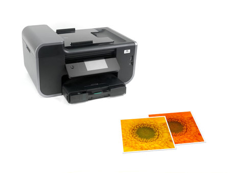 A multi function printer isolated against a white background
