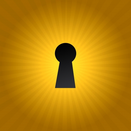 A keyhole isolated against a black backgroundの写真素材
