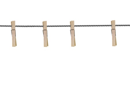 A wooden peg isolated against a white backgroundの写真素材