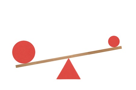 An abstract image of a set of balance scalesの写真素材