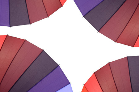 A close up shot of a colourful umbrellaの写真素材