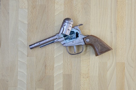 A close up shot of a toy hand gunの写真素材