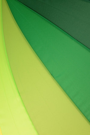 A close up shot of a colourful umbrellaの写真素材