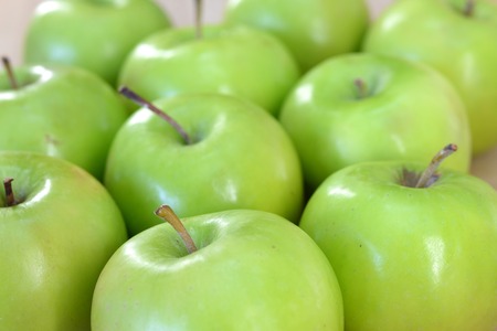 A close up shot of green applesの写真素材