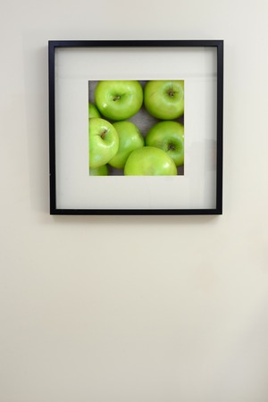 A close up shot of a hanging picture frameの写真素材